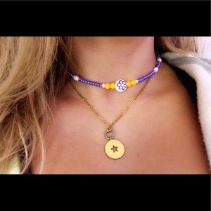 Brandy Melville Jewelry - purple flower charm necklace Brandy Melville Jewelry - purple flower charm necklace